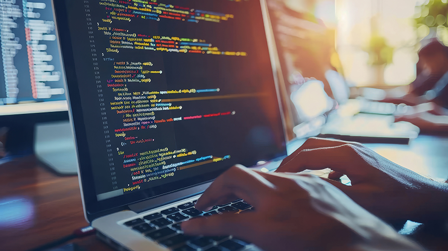 coding on laptop